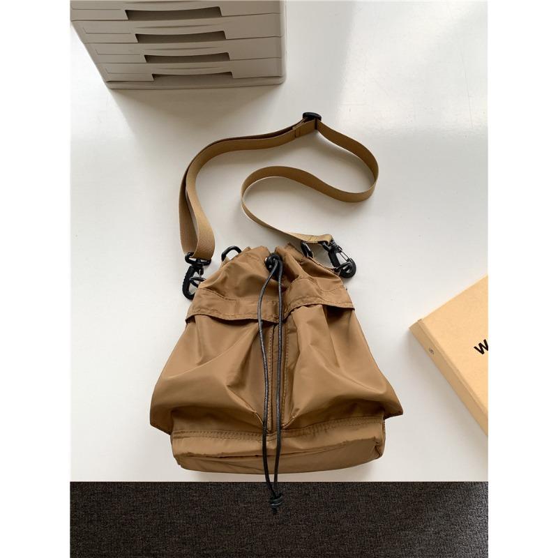 

Сумка Женская Сумка на шнурке Складная На плечо Кроссбоди Большая вместимость Повседневная Универсальная Легкая Портативная Нейлоновая Сумка-ведро Женская коричневый