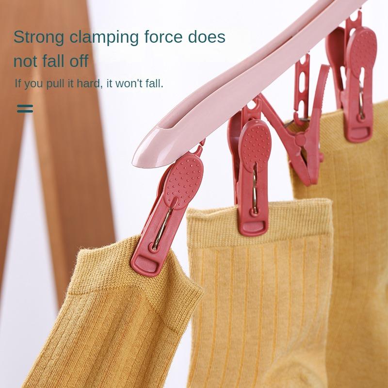 1 szt. Wielofunkcyjny wiatroszczelny wieszak do suszenia z 8 klipsami do ubrań, bielizny, skarpetek, cukierkowego koloru plastikowy wieszak na ubrania