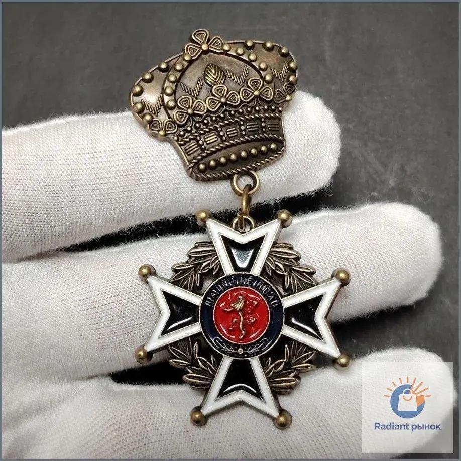 The collection badge with the cross of the Prussian Empire, made of metal in vintage style, is a high-quality military souvenir on a pin.