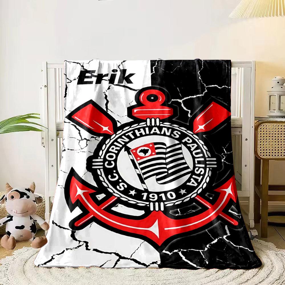 

A nautical-themed emblem with red anchors, paddles, and a striped flag. for all seasons blanket lunch break throw gift 80cm x 120cm