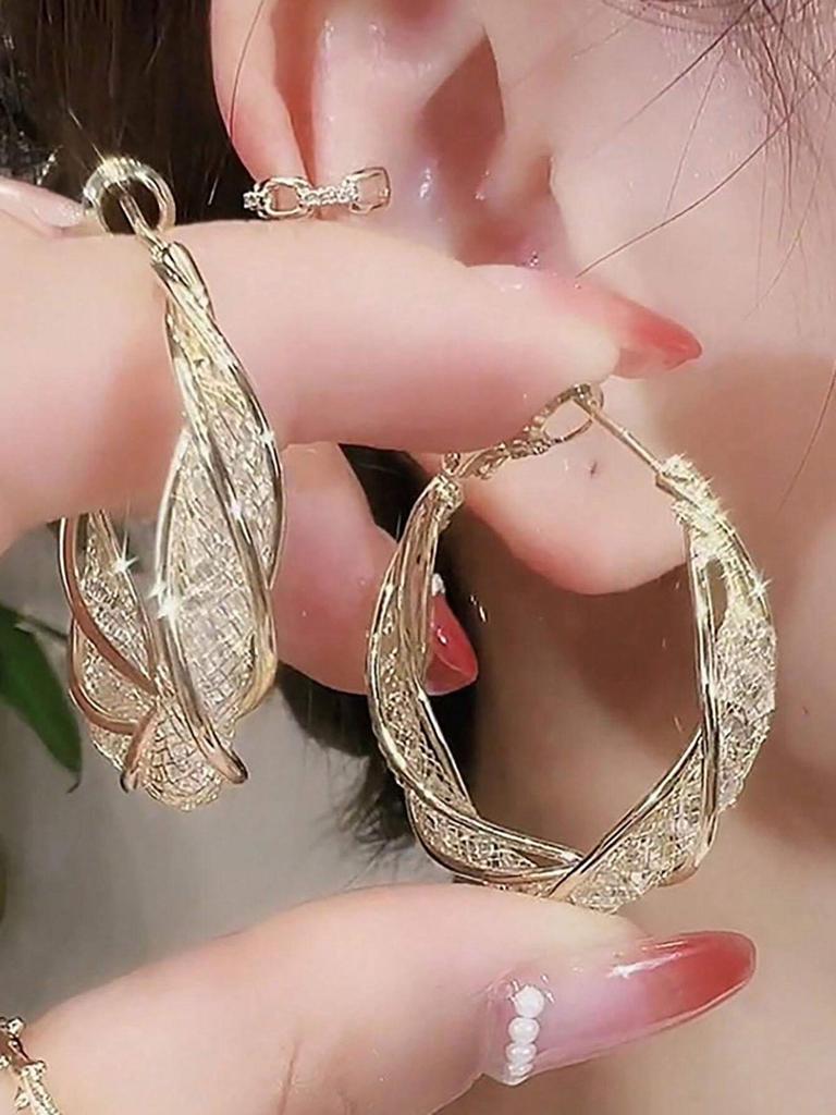 Wunderschöne verschlungene goldfarbene Creolen mit filigranem Netzmuster, stilvolle Ohrringe für Damen, Partygeschenk, Zirkon