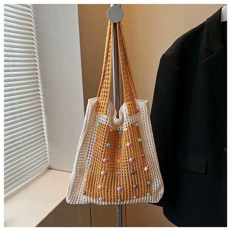 

Wind flow hollow breathable shoulder bag niche design pearl bag vitality girl wind shoulder bag жовтий