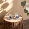 Hot-selling irregular round cake hand-painted enamel color earrings niche design sense premium French versatile stud earrings