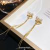 Mosquito coil disc ear clips, high-end temperament, three pearls, long fringed earrings, simple, no earrings, showing face and thin earrings.