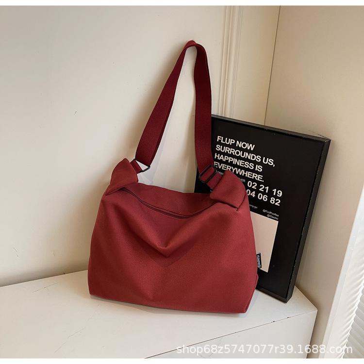 2025 New Canvas Casual Large Capacity Commuter Bag Women's One Shoulder Crossbody Bag Women's Bag Fashionable Versatile Tote Bag