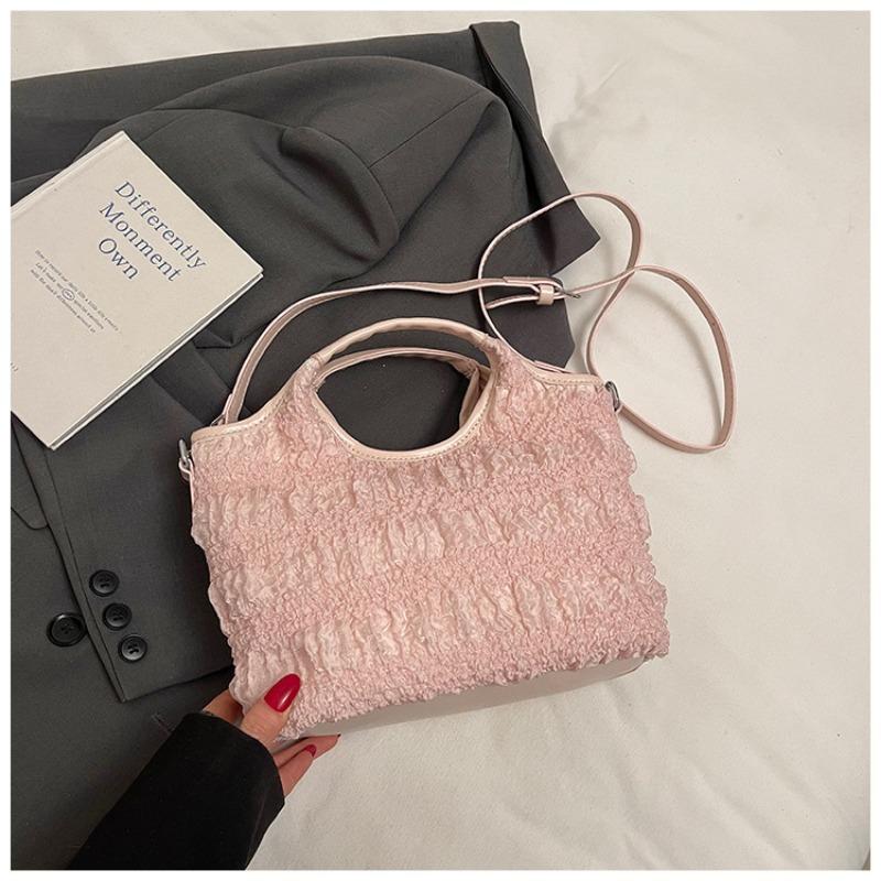 

New hand-carried bucket bag women s spring and summer high-end fashion shoulder bag commuter oblique span bag