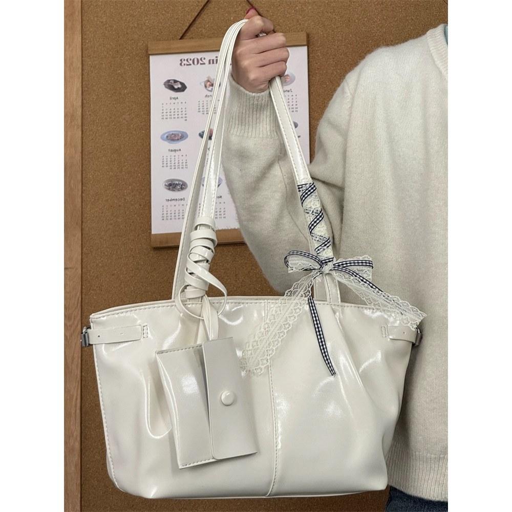 

2025 Новая нишевая дизайнерская сумка подмышку в Южной Корее, студенческая сумка через плечо, простая сумка-тоут в виде овощной корзины белый