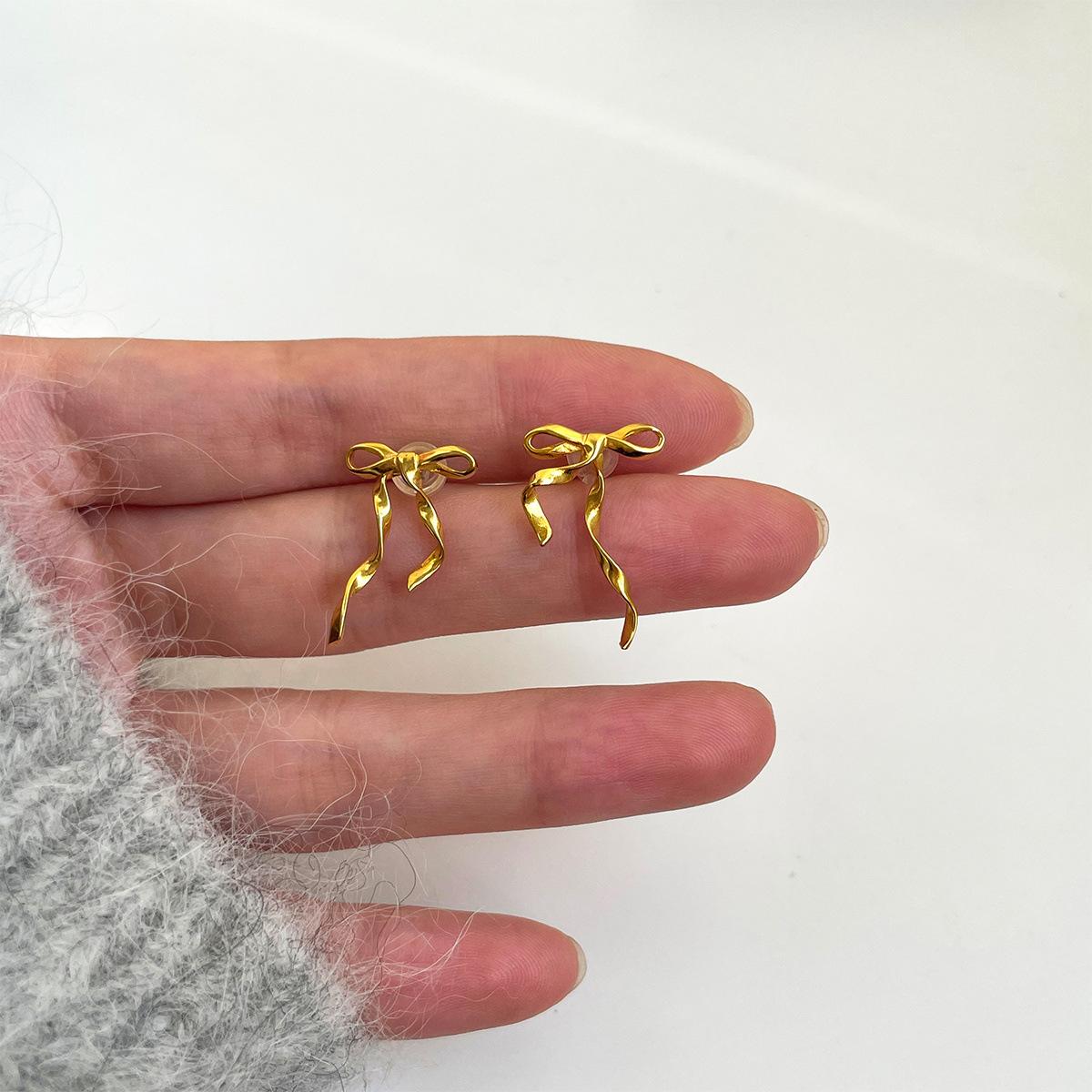 

Silver needle ribbon bow stud earrings Mori series sweet little fragrant earrings niche high-end spring new earrings 925 silver needle