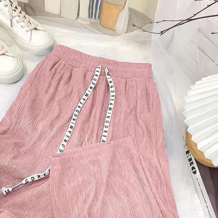 

Жіночий літній комплект з двох предметів: Футболка з літерою C і широкі брюки One Size (Approx. 80-150 lbs)