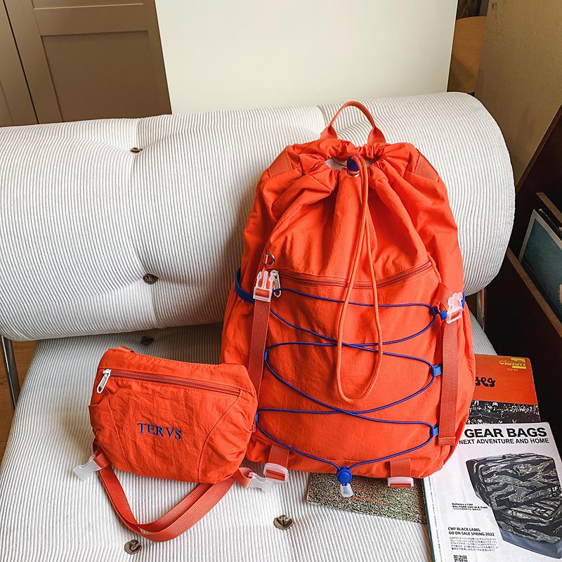 The new outdoor drawstring backpack is removable, the two-in-one backpack has a large capacity, and the commuter schoolbag is water-proof. оранжевый