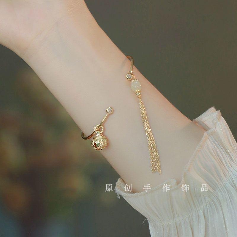Half bracelet female niche design sense tassel transfer bead bell ancient style national style bracelet advanced sense