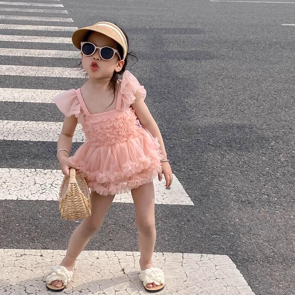 

Девочки Розовый Купальник с Сетчатой Юбкой с Открытой Спиной - Летняя Коллекция 2025 140