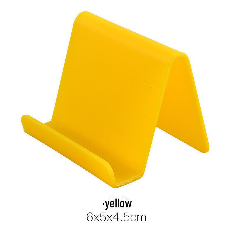 

Креативный настольный автомобильный держатель для мобильного телефона - простая пластиковая подставка с возможностью нанесения индивидуального логотипа жёлтый