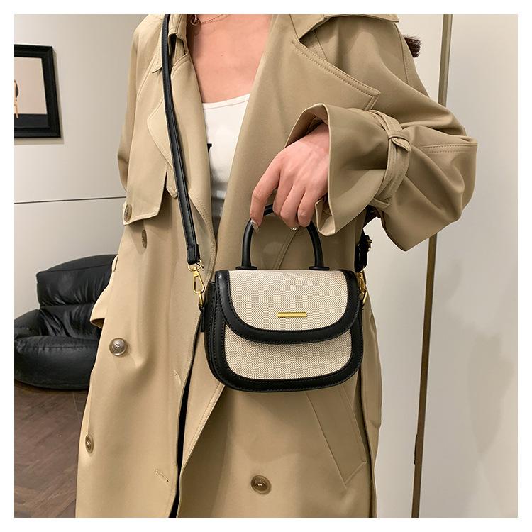 Borsa a sella portatile con texture premium da donna, nuova borsa a tracolla messenger retrò alla moda con inserti a contrasto di colore