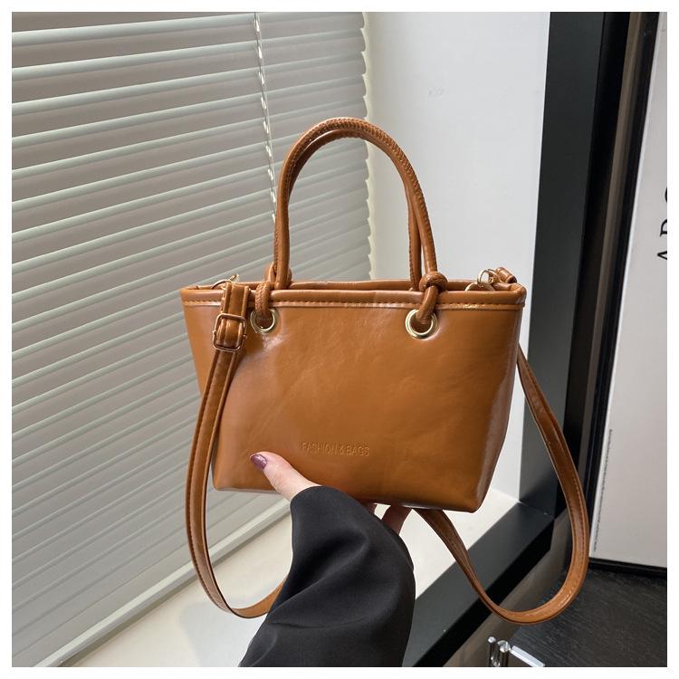 

2024 Осенняя Ретро Текстурная Сумка-тоут: Шикарная однотонная сумка-ведро на плечо и через плечо