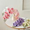 Bionic Phalaenopsis Floral Arrangement: Realistic Fake Flower Decor for Living Room or Dining Table.