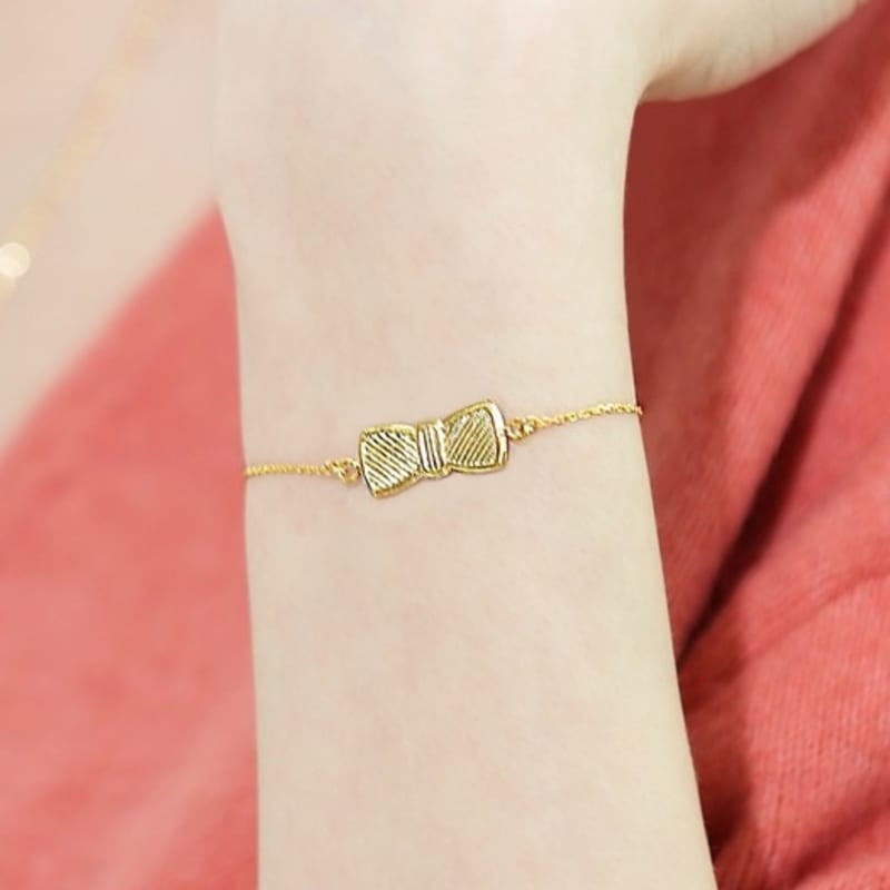 BONBEAU Morris pajarita colgante pulsera chapada en oro