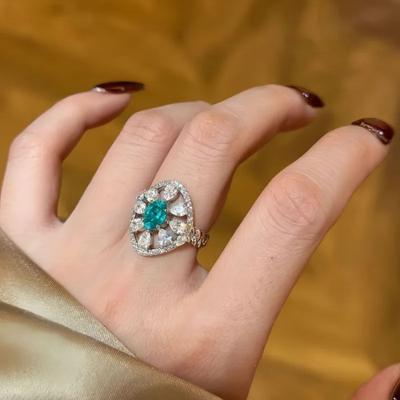 Leichter Luxus High-End Paraiba hohle Ringe für Damen eingelegter Kristall Wassertropfen ovaler blauer Ring Hochzeitsschmuck Geschenk