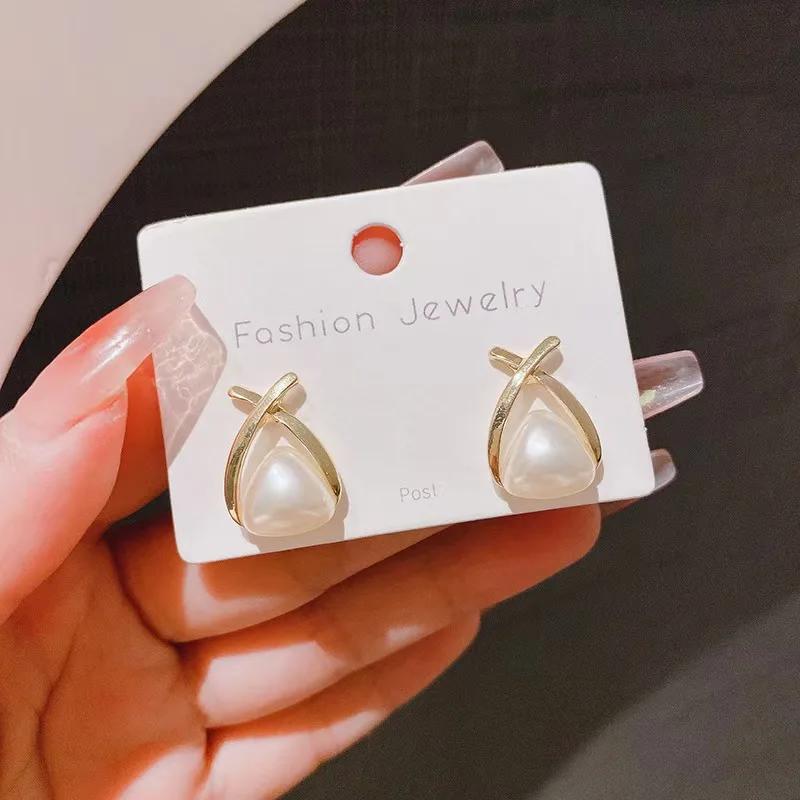 

Delicate small stud earrings high-grade light luxury cross pearl earrings simple everything accessories