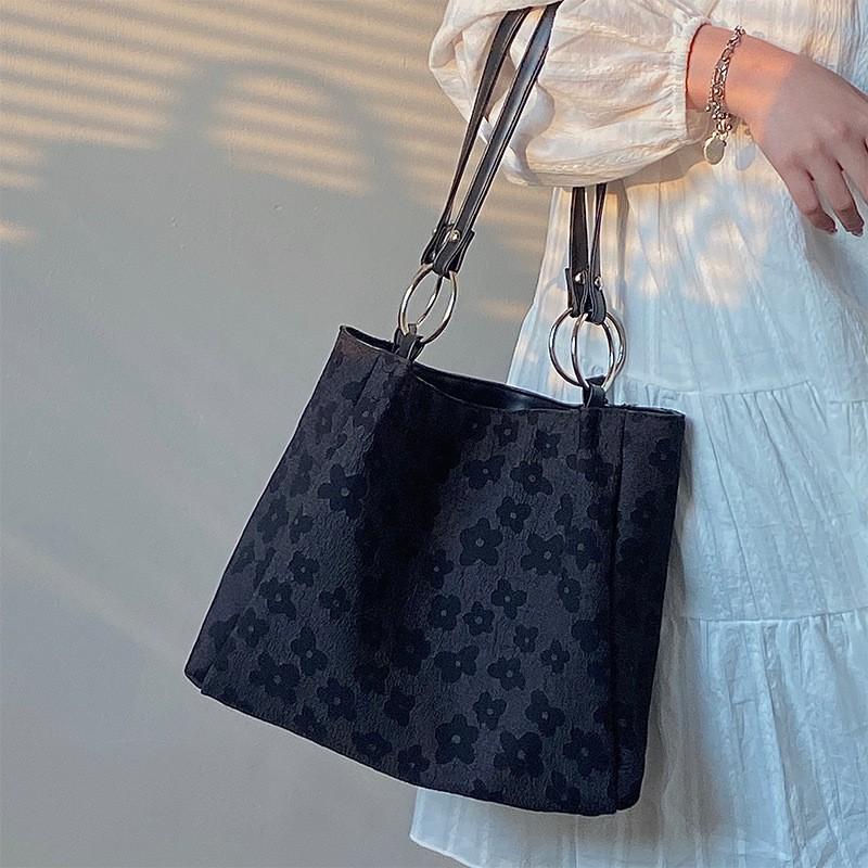 

Large Capacity Canvas Bag Women 2026 Black Sun Flower Student Handbag Commuting All-matching Tote