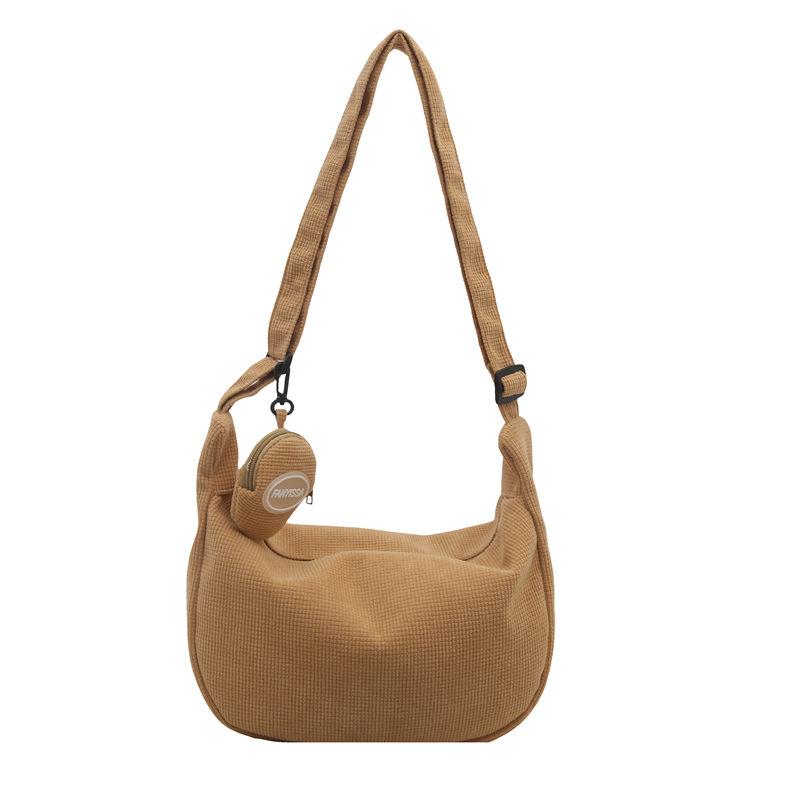 Corduroy bag women's large capacity 2025 new spring and summer leisure shoulder messenger cloth bag class commuter dumpling bag