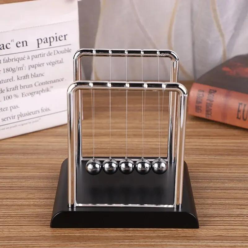 Newtons Cradle Balance Stålkule Undervisningsmateriell Fysikk Vitenskap Pendel Skrivebordsleker Stressavlastningsgaver Hjemmedekorasjon