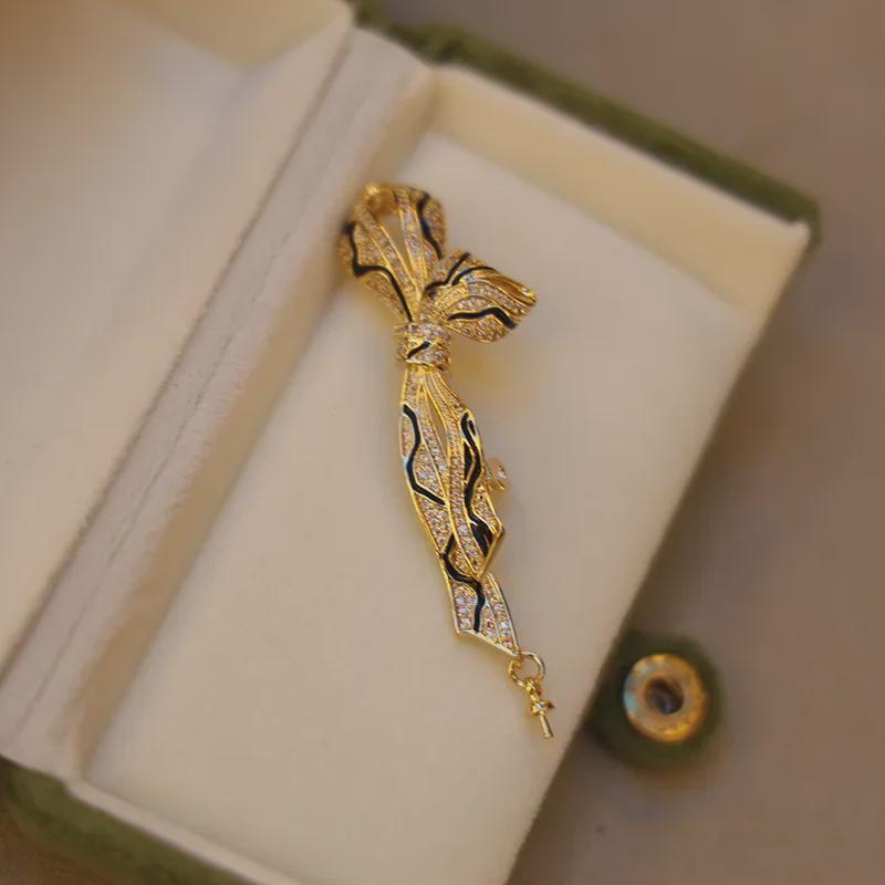 Gold-Plated Cloud Knot Brooch with Zircon and Pearl