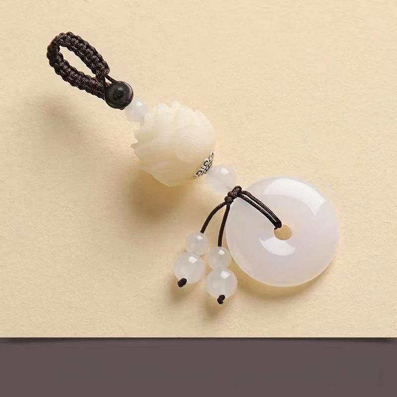 

Bodhi Lotus Keychain With Peace Pendant. Unisex Spiritual Enlightenment Gift For Car Or Keys белый