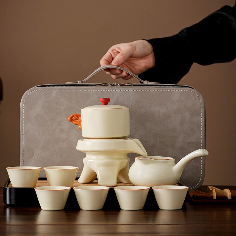 

Бытовой чайный набор Кунг-фу из печи Жу с открывающейся пленкой может поднимать чайник, чайную чашку, ленивый, защищающий от ожогов, автоматический чайный артефакт, полный набор