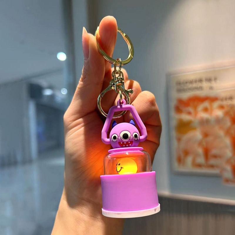 

Adorable Silicone Monster Keychain Light Cute Pendant For Bags And Cars фиолетовый