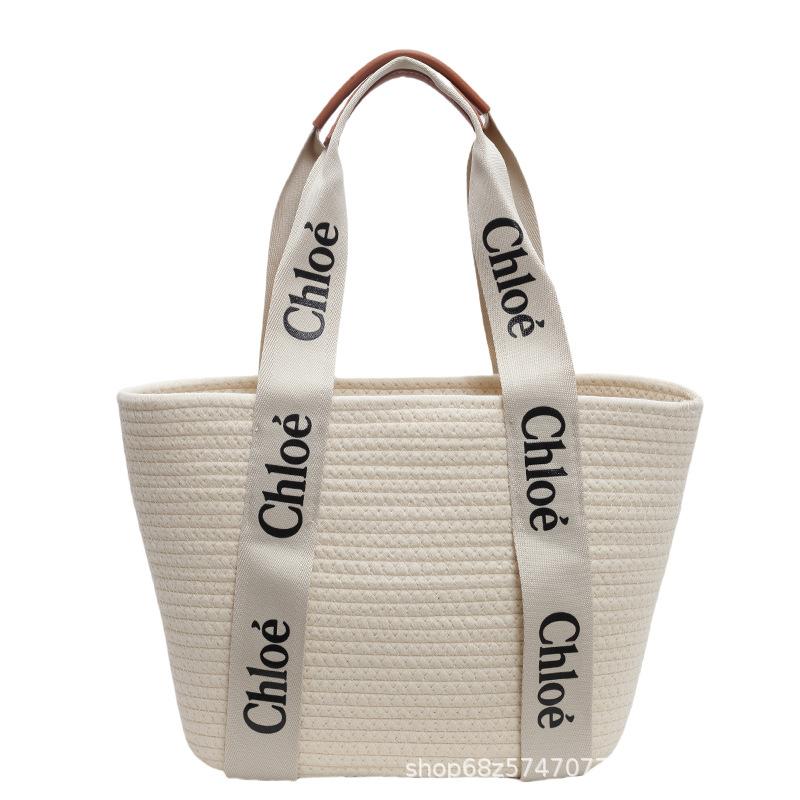 Gewebte Tasche im ausländischen Stil, Damen, Frühjahr/Sommer 2025, neue französische Schultertasche, Freizeit-Urlaubstasche, Strandtasche, Gemüsekorb