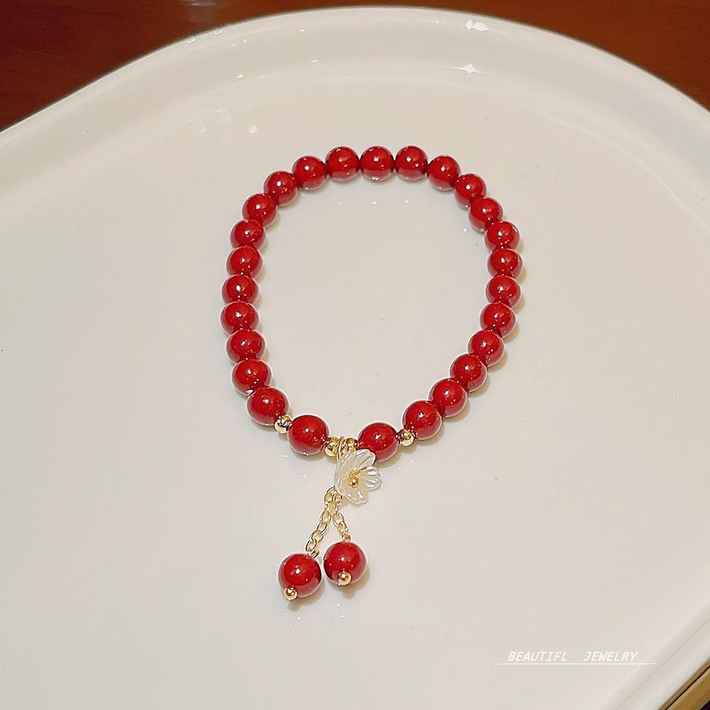 New design rock crystal elastic bracelet sweet temperament strawberry crystal bracelet jewelry girl.