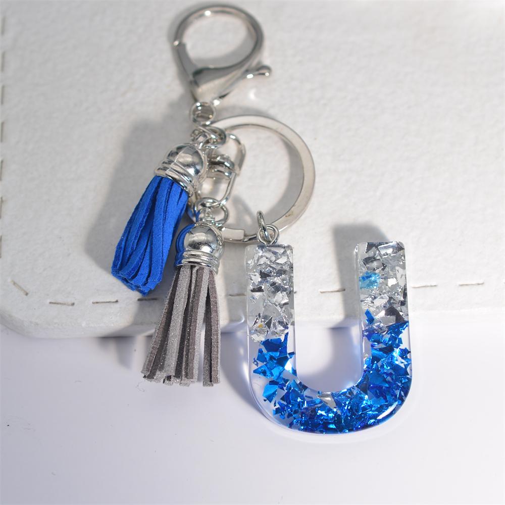 Креативные брелки из смолы с 26 буквами и кисточками — фото 26