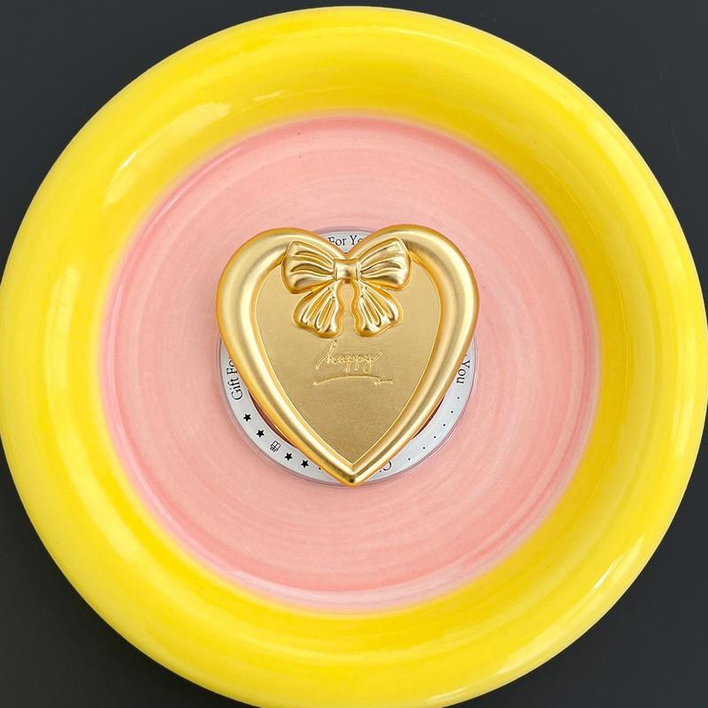 

Electroplated Love Bow Metal Airbag Holder Mobile Phone Magnetic Suction Magsafe Extendable Back Sticker Desktop Watching TV Shows