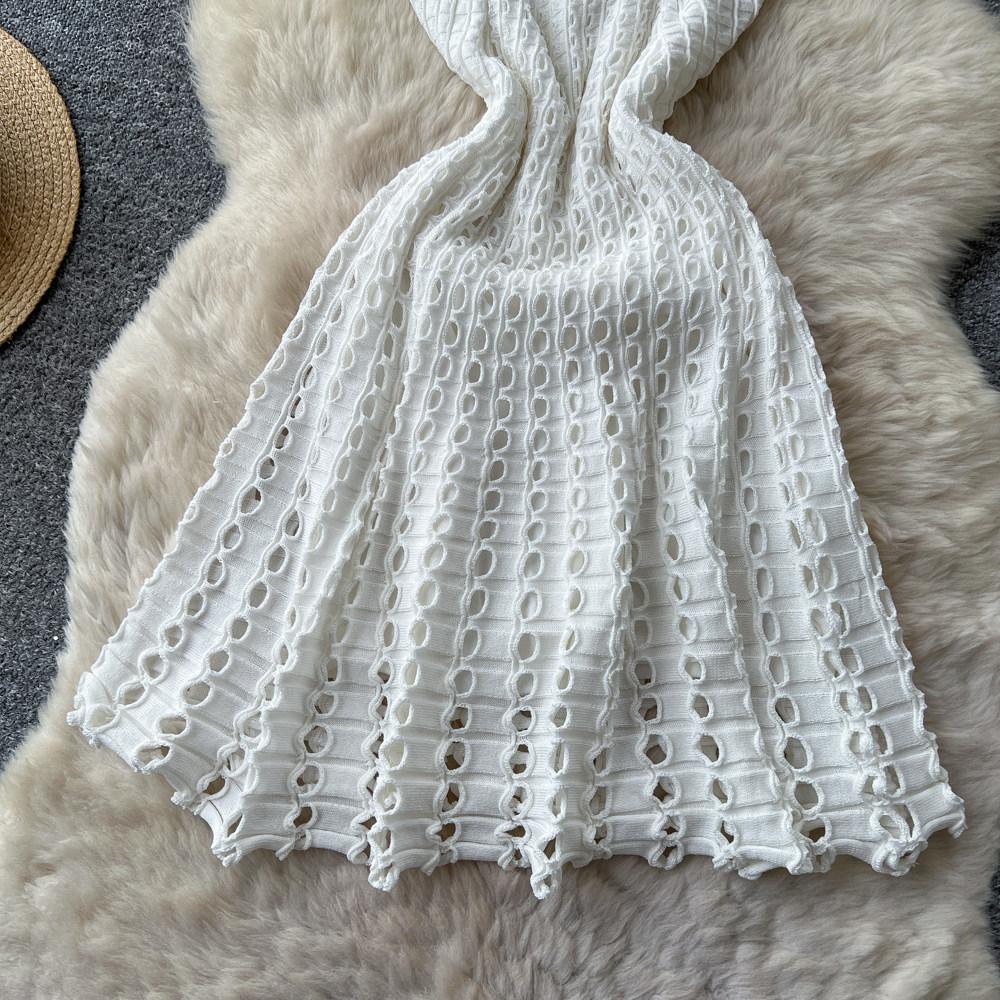 Sleeveless neck knitted design dress for women's summer sexy backless hollow and thin A-shaped skirt light luxury