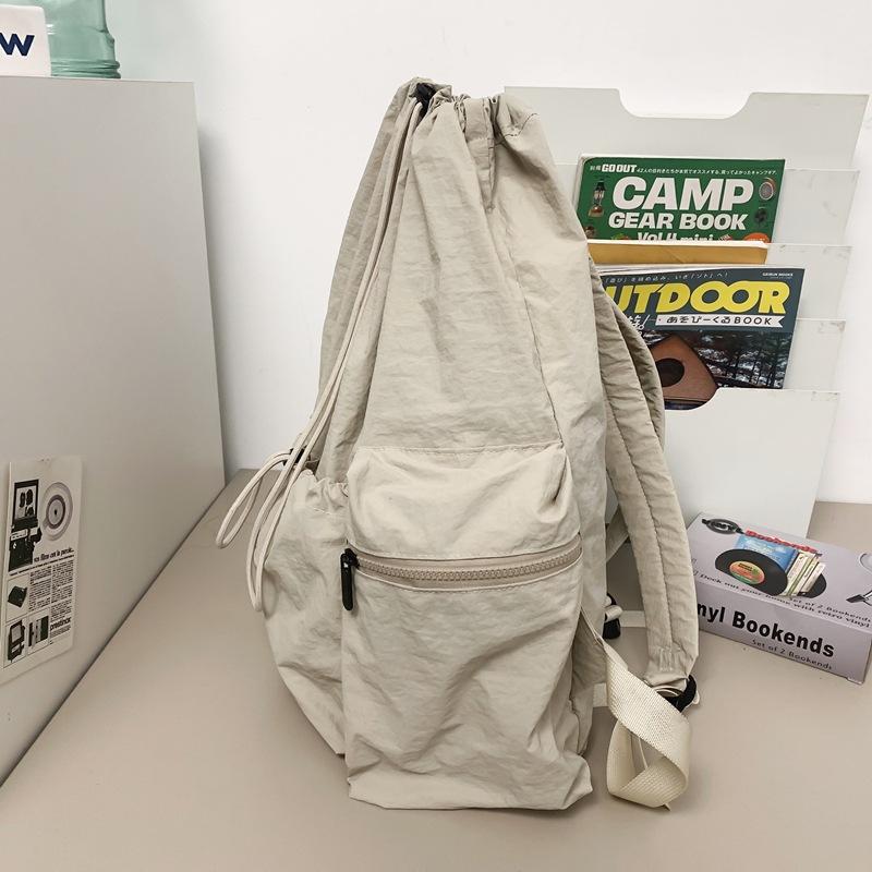 Schoolbag Korean version lazy wind drawstring backpack women's bag 1011 summer new high-value large-capacity lightweight breathable backpack