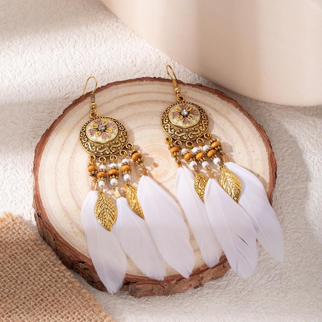 Retro ethnic style woven feathers long fringed earrings, bohemian high-end hollow rice bead earrings