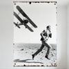 Vintage Retro Tin Sign Black & White Man In Suit Running with Biplane Pursuit Metal Plaque for Man Cave Home Bar Decor