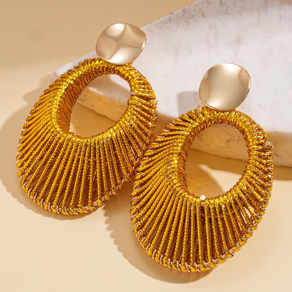 European and American personalized golden velvet woven hollow oval silver needle earrings niche earrings 