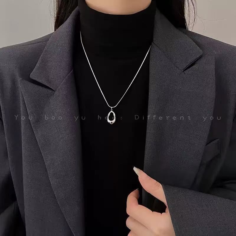 Hollow water drop pendant necklace women do not fade cold wind temperament sweater chain minimalist personality niche accessories design