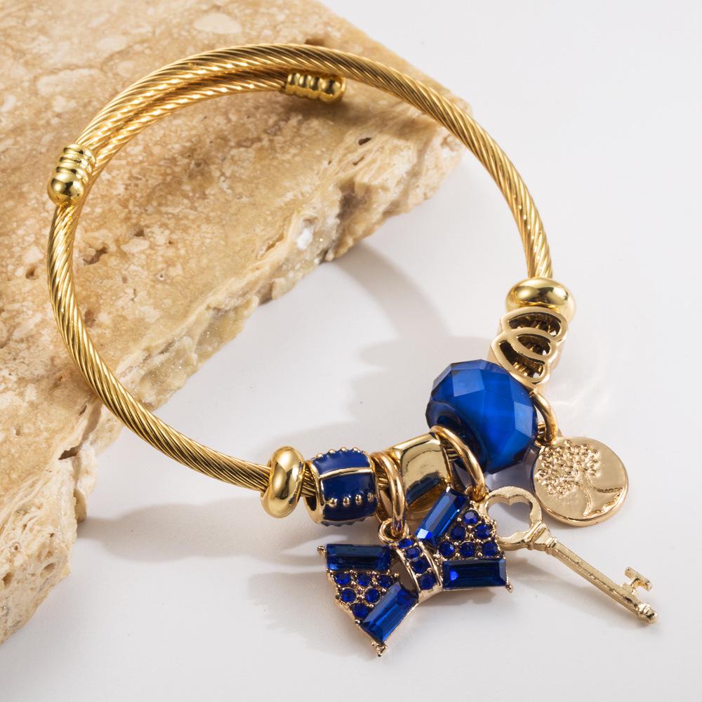 Bracelet Panjia Fashion Or Acier Inoxydable Nœud Papillon avec Perles de Cristal et Pendentif Strass.