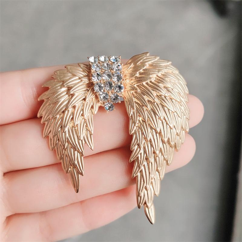 

Ретро-брошь в виде пера из золота и крыльев, персонализированные легкие роскошные аксессуары для банкета, булавка для корсажа