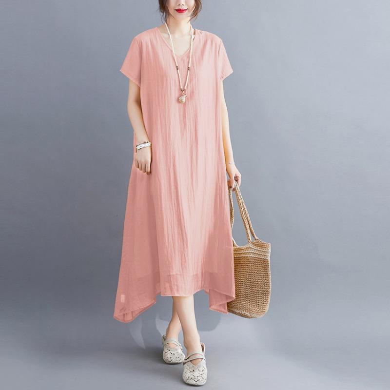 A Woman In A Solid V-neck Dress for Summer