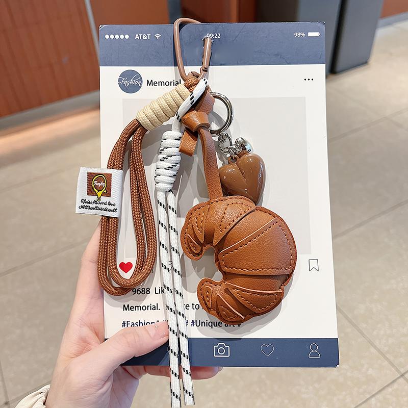 Yogodlns New Braided Rope Croissant Bag Pendant Bread Shape PU Leather Mobile Phone Lanyard Bag Decoration