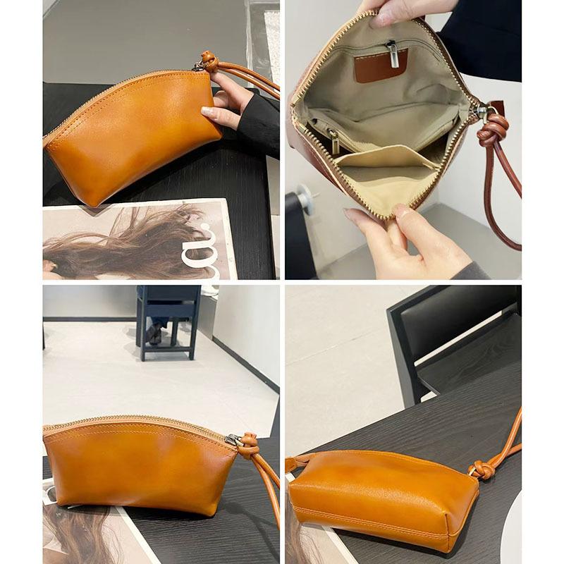 Handheld wallet New leather casual dinner bag First layer cowhide cosmetic bag Fashion versatile women's bag