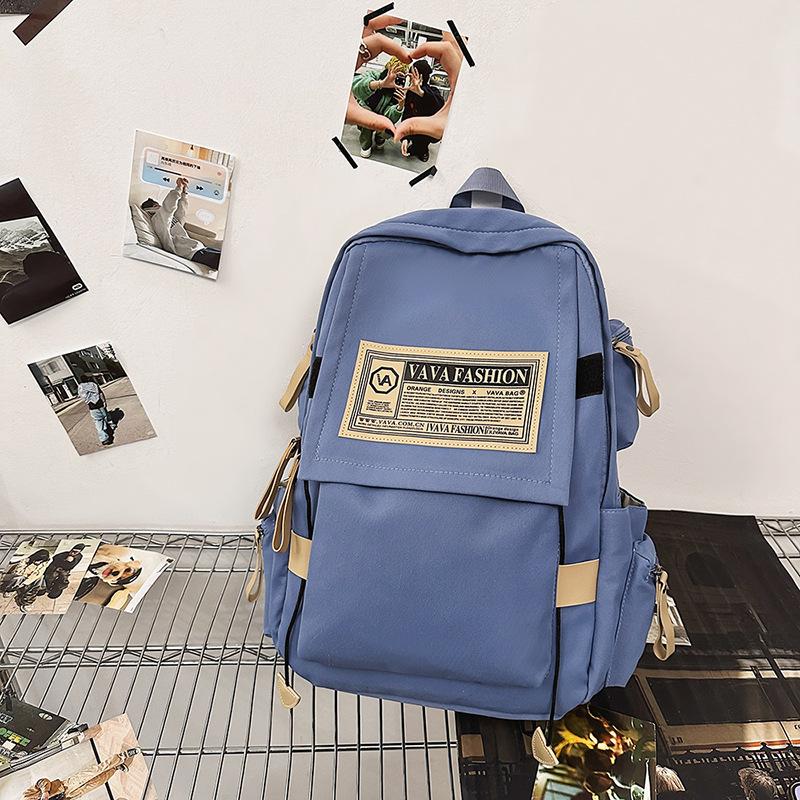 New large-capacity schoolbag men's trendy cool couple casual backpack Korean version ins junior high school student computer backpack
