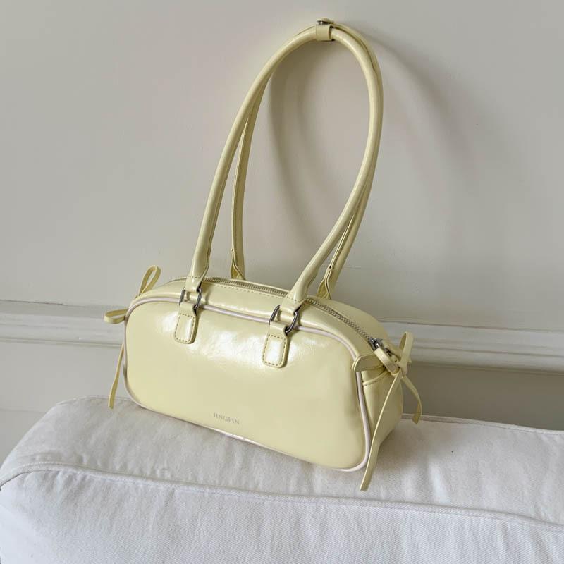 

2025 new niche ballet style bow underarm baguette bag women s foreign style simple commuter portable shoulder bag жёлтый