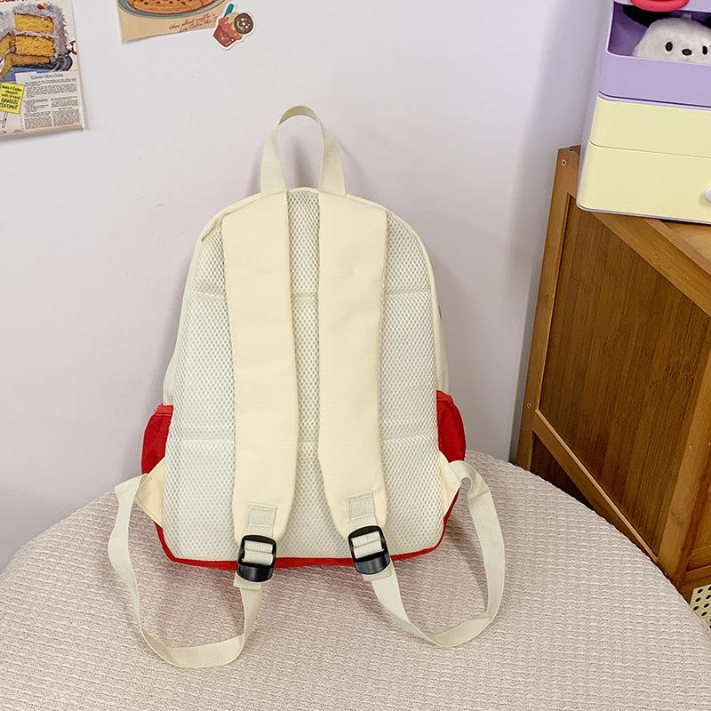 The schoolbag has high value, sweet, fresh and cute printing back, and the leisure and large capacity of junior high school students.
