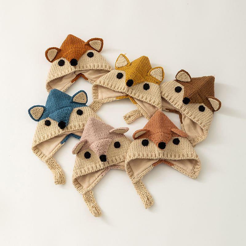 Korean-Style Hand-Knitted Wool Hat for Newborns – Warm, Windproof, and Ear-Protective for Boys and Girls.