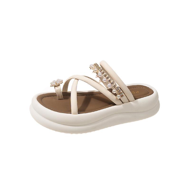 Women's Korean version of cool slippers thick-soled non-slip one-word slippers 2025 summer outer wear lady set toe pearl Roman sandals